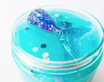 Mermaid Tail glitter slime with mermaid charm Popular clear slime Little mermaid party favors Cheap slime BlissBalm slime shop Sparkly slime