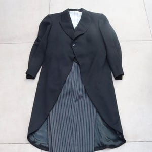 Vintage rokkostuum met vest en Stresemann-broek
