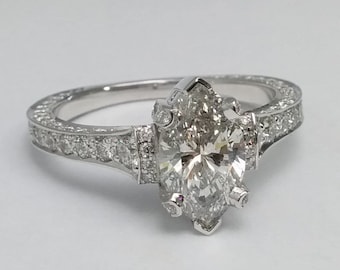 Large Marquise Diamond Cathedral Graduated Pave Engagement Ring