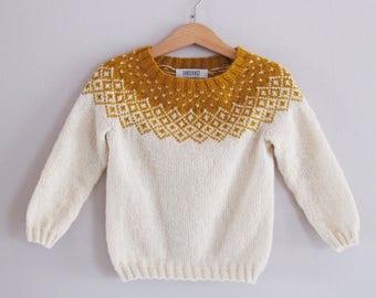 Bohéme Baby Sweater. Hand knit baby sweater. Wool from the Faroe Islands.