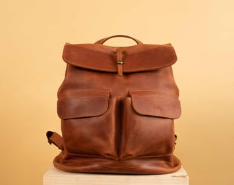Handcrafted LEATHER BACKPACK in cognac brown Color with two front pockets and cotton lining