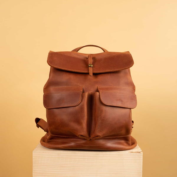 Handcrafted LEATHER BACKPACK in cognac brown Color with two front pockets and cotton lining