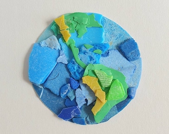 Earth made from tiny pieces of plastic collected from beautiful Cornish beaches UK. Cornwall. Beach clean. Repurpose. Original art. Reuse