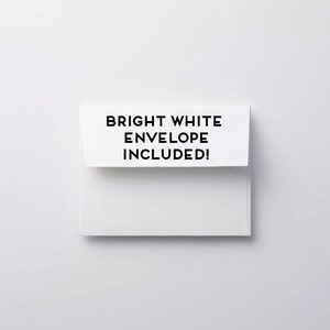 May include: A white envelope with the text "BRIGHT WHITE ENVELOPE INCLUDED!" printed on the front.