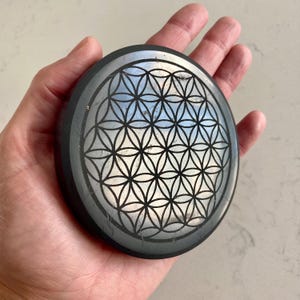 Shungite Plate: Flower of Life Carving, EMF Protection (10 cm)