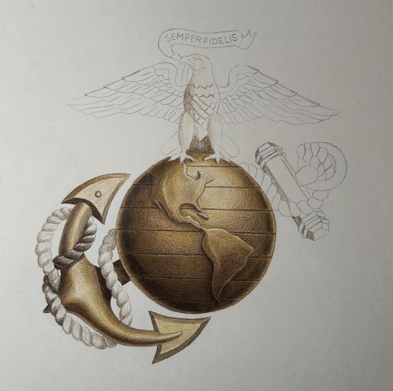May include: A pencil and colored pencil drawing of the United States Marine Corps emblem. The design features a golden globe with the Americas, a golden anchor wrapped in white rope, and a sketch of an eagle with a banner reading SEMPER FIDELIS.