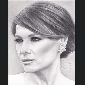 May include: A black and white graphite pencil drawing of a person with side-swept hair, wearing a detailed floral-shaped earring. The portrait captures the facial features, including defined eyes, eyelashes, and lips, rendered with shading.