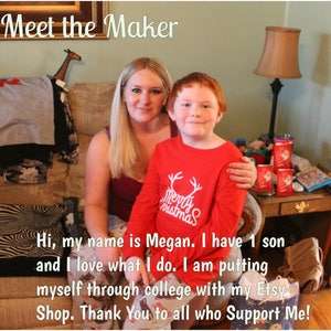 May include: A woman and a young boy sit on a couch. The woman is wearing a maroon shirt and the boy is wearing a red shirt with the text "Merry Christmas". The woman is smiling and the boy is looking at the camera. The text "Meet the Maker" is at the top of the image. The text "Hi, my name is Megan. I have 1 son and I love what I do. I am putting myself through college with my Etsy Shop. Thank You to all who Support Me!" is at the bottom of the image.