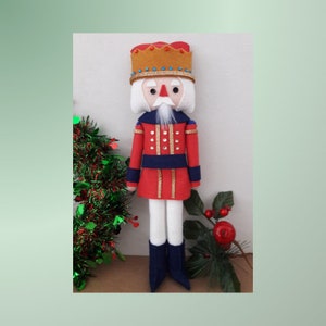 Nutcracker Felt Christmas Decoration in red - an instantly downloadable pattern to start stitching