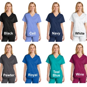 May include: Eight women's V-neck scrub tops in various colors: black, ceil, navy, white, pewter, royal, teal blue, and wine.