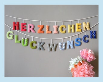 Girlande HERZLICHEN GLÜCKWUNSCH, Regenbogen, aus Stoffbuchstaben, Wanddeko