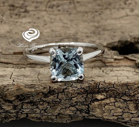 14K White Gold 7mm Cushion Cut Aquamarine & Diamond Halo Ring 14K White Gold 7mm Cushion Cut Aquamarine & Diamond Halo Ring