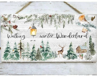 May include: A white wooden sign with a watercolour painting of a winter wonderland scene. The sign reads "Walking in a winter wonderland".