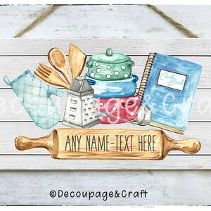 May include: A white wooden sign with a watercolour illustration of kitchen utensils, including a rolling pin, a cookbook, a grater, a pot, and a spatula. The text "ANY NAME - TEXT HERE" is written on the rolling pin.
