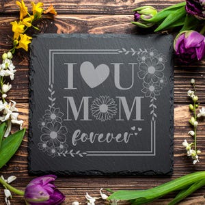 May include: A set of three ceramic mugs with a speckled, matte finish. The mugs are in shades of cream, light gray, and dark gray. Each mug has a simple, minimalist design and a rounded handle.