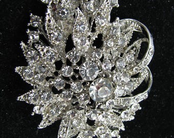 Fabulous Brooch Rhinestone comes in a Neiman Marcus box large 2 3/4" not signed this is a show stopper.