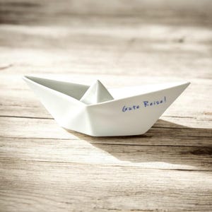 Regalo di addio - nave in porcellana con la scritta "bon voyage"