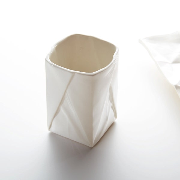 Porcelain Origami Cup, handmade coffee mug in folded paper design with folds and kinks
