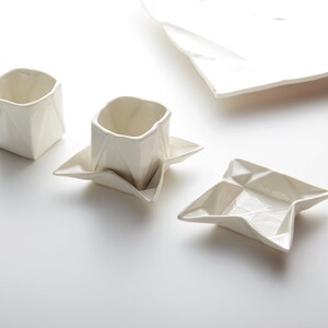 Origami espresso cup made of porcelain including saucer, with folds and kinks like folded paper image 2