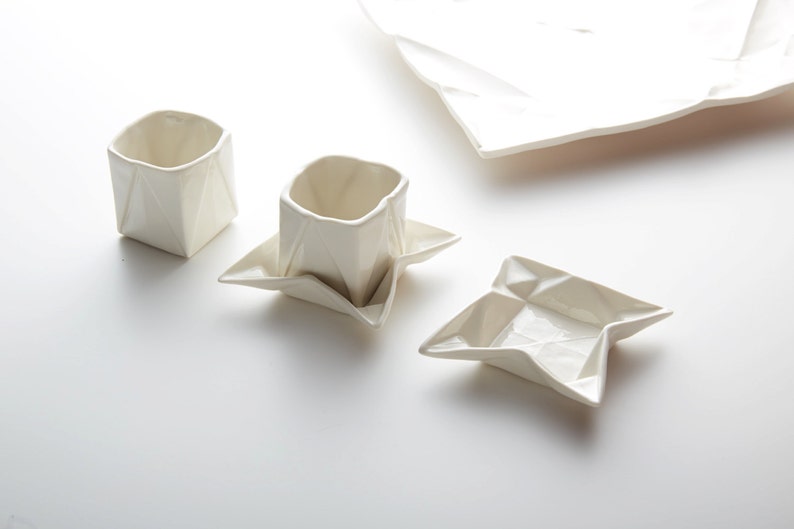 Origami espresso cup made of porcelain including saucer, with folds and kinks like folded paper image 2