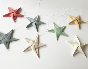 Flat porcelain stars inspired by paper in bright colors