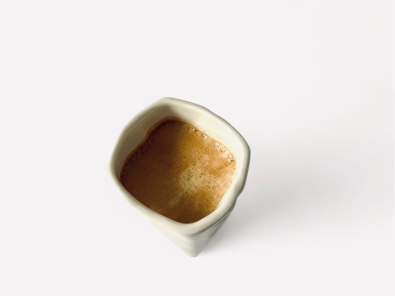 Origami espresso cup made of porcelain including saucer, with folds and kinks like folded paper image 4