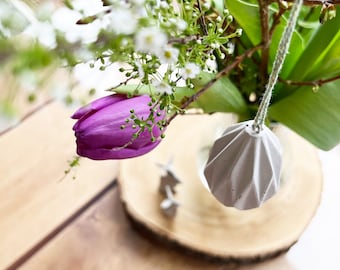 Paaseieren van beton - moderne paasversiering voor het paasboeket