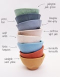 colorful eggcup handmade of porcelain, eight colors to chose from to fit on your breakfast table