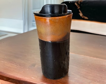 Handmade 16-Ounce Cinnamon and Black Travel Mug - Stylish Pottery with Locking Lid and Sleeve for Your On-the-Go Coffee Enjoyment