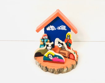 Small Nativity  hand painted in the La Palma folk art style, made famous by Salvadorian artist, Fernando Llort. 4 inches aprox