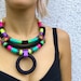 see more listings in the BIB NECKLACE section