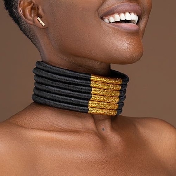 AFRIPICS - Portrait and profile of a traditional Ndebele woman wearing neck  rings and a beaded hat