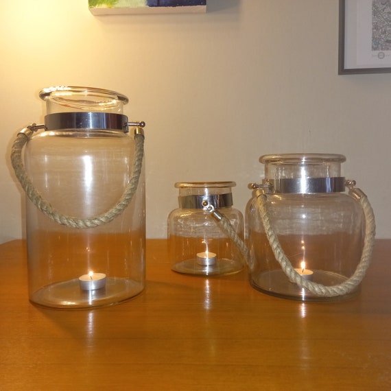 recycled food jars turned storage jars with glass knob tops