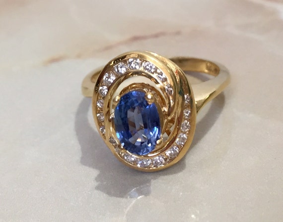 Blue Sapphire And Diamond Swirl Ring, 18K Yellow Gold: Vintage 1980s Cocktail Ring