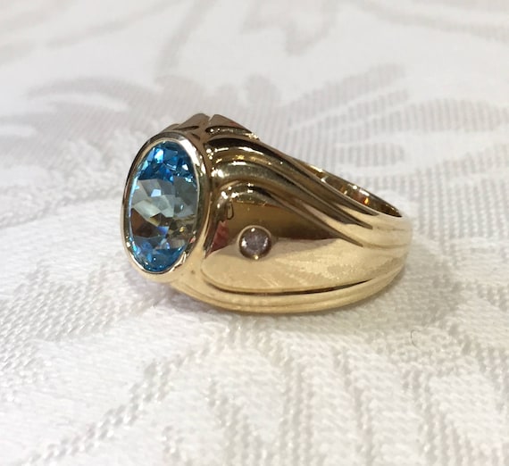 RUDRAFASHION 14k Yellow Gold Plated Round Cut Blue Topaz 925 Sterling Silver Mens Anniversary Band Ring