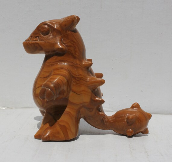 dinosaur with spikes and club tail