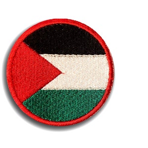 May include: A round embroidered patch with the Palestinian flag. The flag is red, white, black, and green.