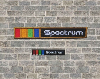 The Spectrum Arena Enamel Lapel Pin and 3-inch Iron-on Patch Combo