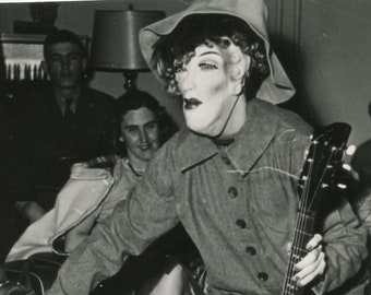 scary masked musician with guitar 1950s snapshot vernacular halloween? photo photograph