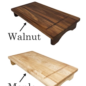 Examples of The Half Stove Top Covers 
Maple And Walnut With A White Background