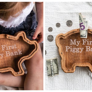 Wooden Pig Shaped Piggy Banks with Personalized Engraving on the Clear Front With White Background And Child Holding Personalized  Bank
USA Red Oak Wood, This wood Gives The Bank A Natural Red/ Brown Look