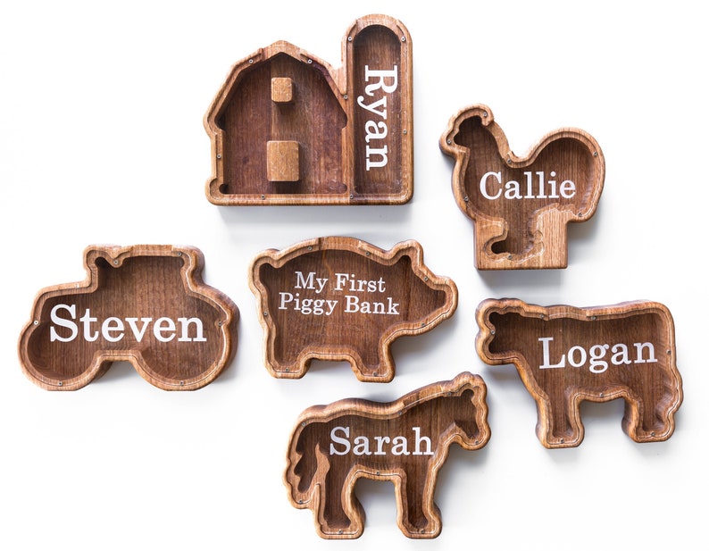 Wooden Farm Shaped Piggy Banks with Personalized Engraving on the Clear Front With White Background.
USA Red Oak Wood, This wood Gives The Bank A Natural Red/ Brown Look (Barn, Tractor, Chicken, Pig, Cow, horse)