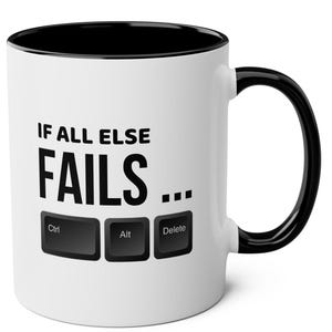 May include: White ceramic mug with a black interior and handle. The mug features the text "IF ALL ELSE FAILS..." with Ctrl, Alt, and Delete keys below. A humorous office or tech-themed gift.