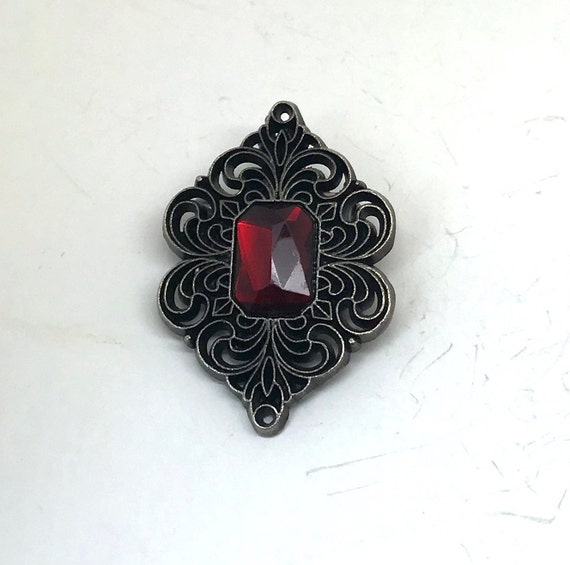 Vintage Filigree Scroll Red Rhinestone Brooch