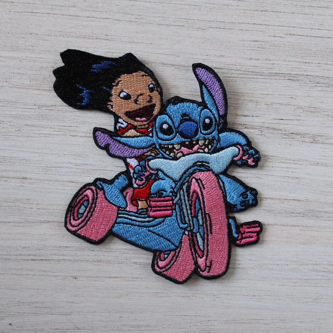 stitch on tricycle