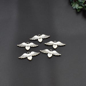 10 Stück 33×14mm Silber Flügel Charms Mit Einem Herz-p2172