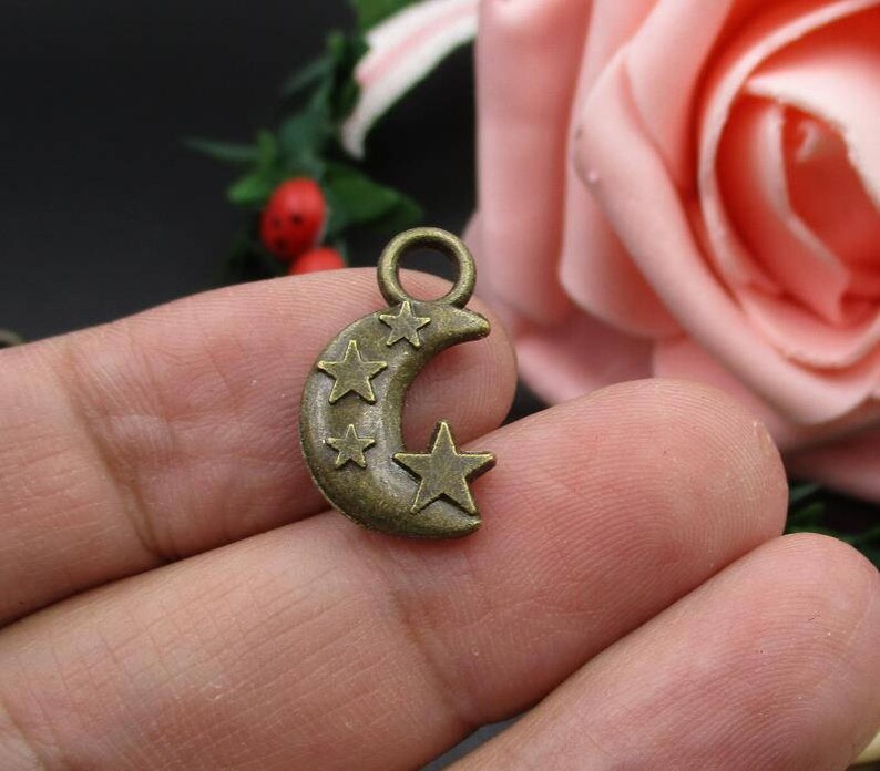 10Pcs 21\u00d713mm Bronze Stars and Moon Charms 2 Sided-p1893-A