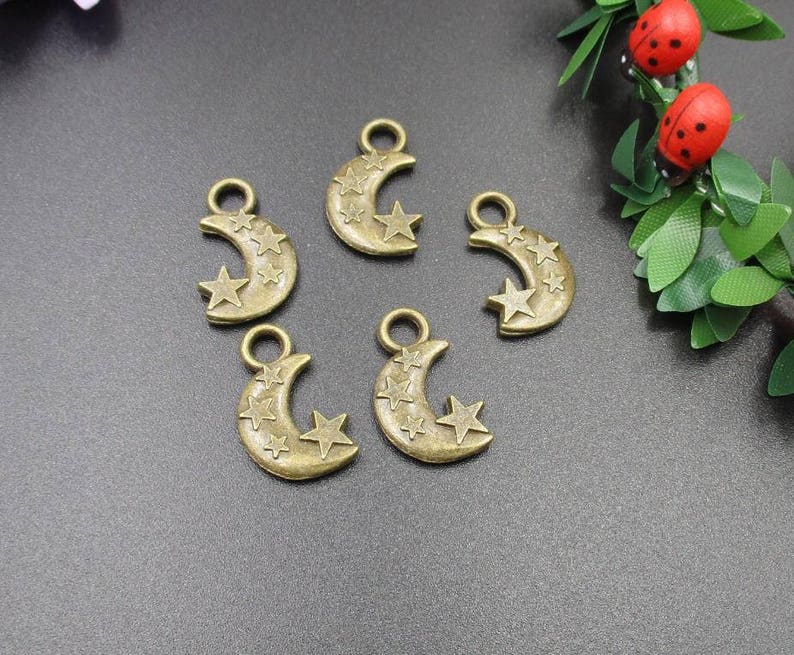 10Pcs 21\u00d713mm Bronze Stars and Moon Charms 2 Sided-p1893-A
