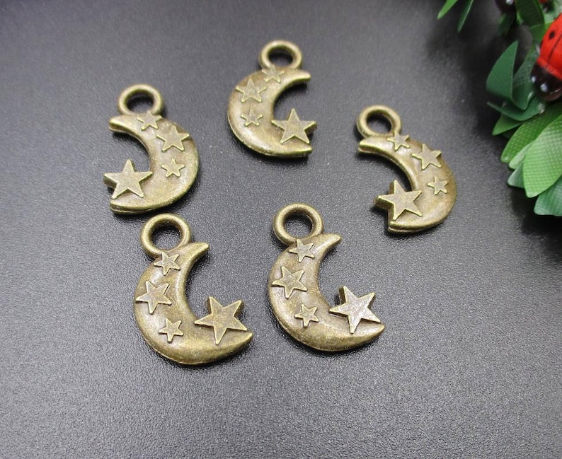 10Pcs 21\u00d713mm Bronze Stars and Moon Charms 2 Sided-p1893-A