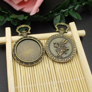 25 pezzi rotondo Lunetta pendente Vassoi cabochon vuoto base per DIY